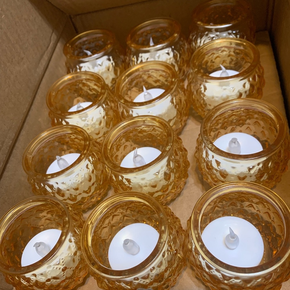 70 gold candle holders with tea lights